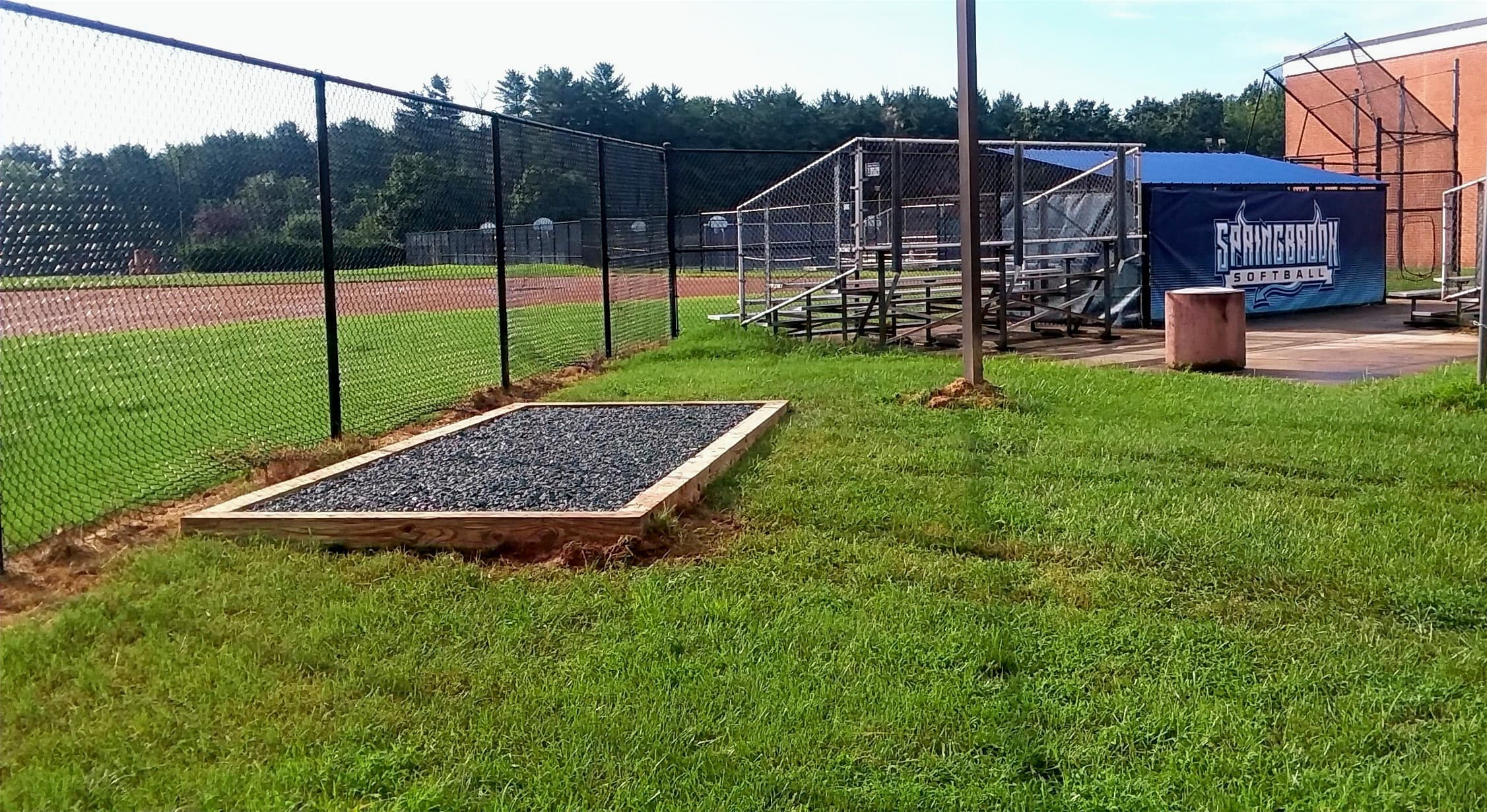 Commercial gravel pad near a ball field